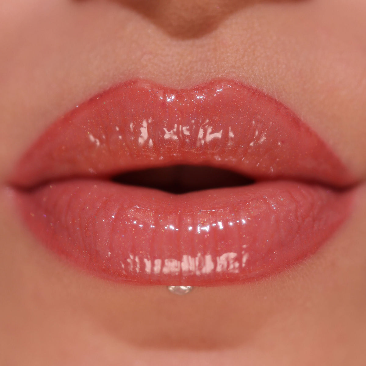 Revolution Pout Bomb Shimmer Gloss Nude Glow